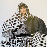 (Issey Miyake)(Photographs by Irving Penn)(Signed copy)